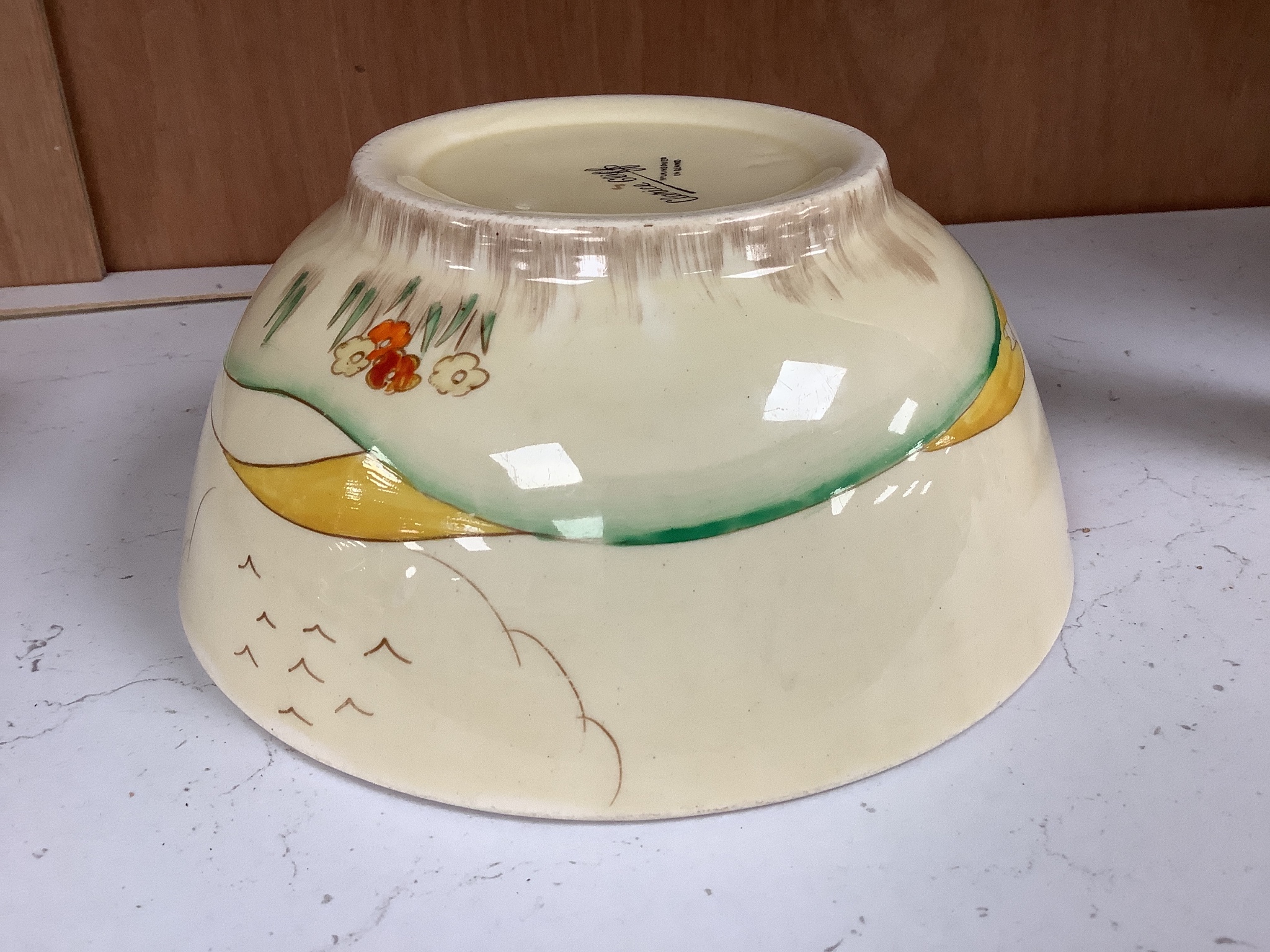 A Clarice Cliff landscape bowl, height 8cm diameter 18cm